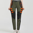 A pair of Arenzza windproof waterproof warm elastic waist hiking pants with insulated waterproof fabric and adjustable waistband.