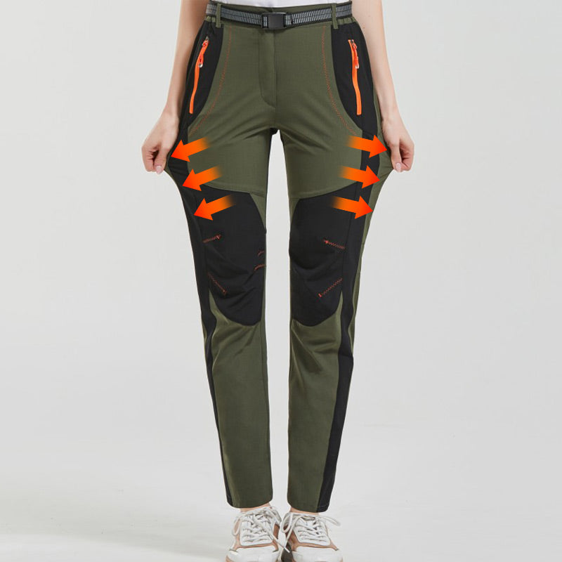 A pair of Arenzza windproof waterproof warm elastic waist hiking pants with insulated waterproof fabric and adjustable waistband.