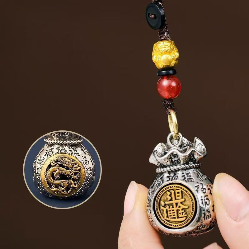 Arenzza Zodiac Fortune Bag Pendant with festive Christmas design, symbolizing good luck and prosperity, on a jewelry display.