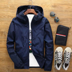 A lightweight hooded outdoor jacket by Arenzza with a sleek design, perfect for outdoor activities and variable weather.