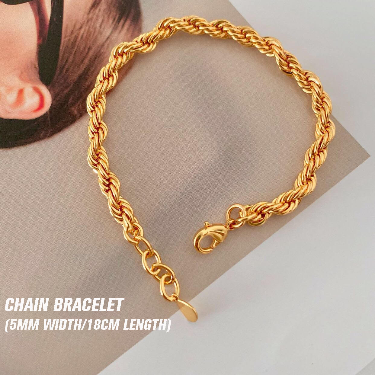 A layered gold twist rope necklace and bracelet set by Arenzza featuring elegant twisting rope design and shiny gold finish.