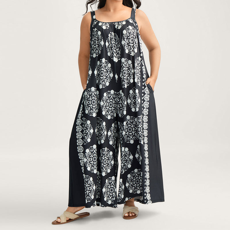 Aarenza adjustable strap loose jumpsuit in soft fabric, featuring wide legs and a relaxed fit, displayed on a hanger.