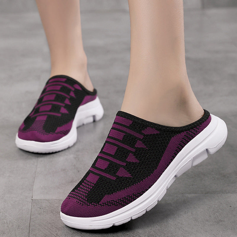 A pair of Arenzza comfortable breathable closed-toe slide slippers featuring soft fabric and cushioned soles for relaxed wear.