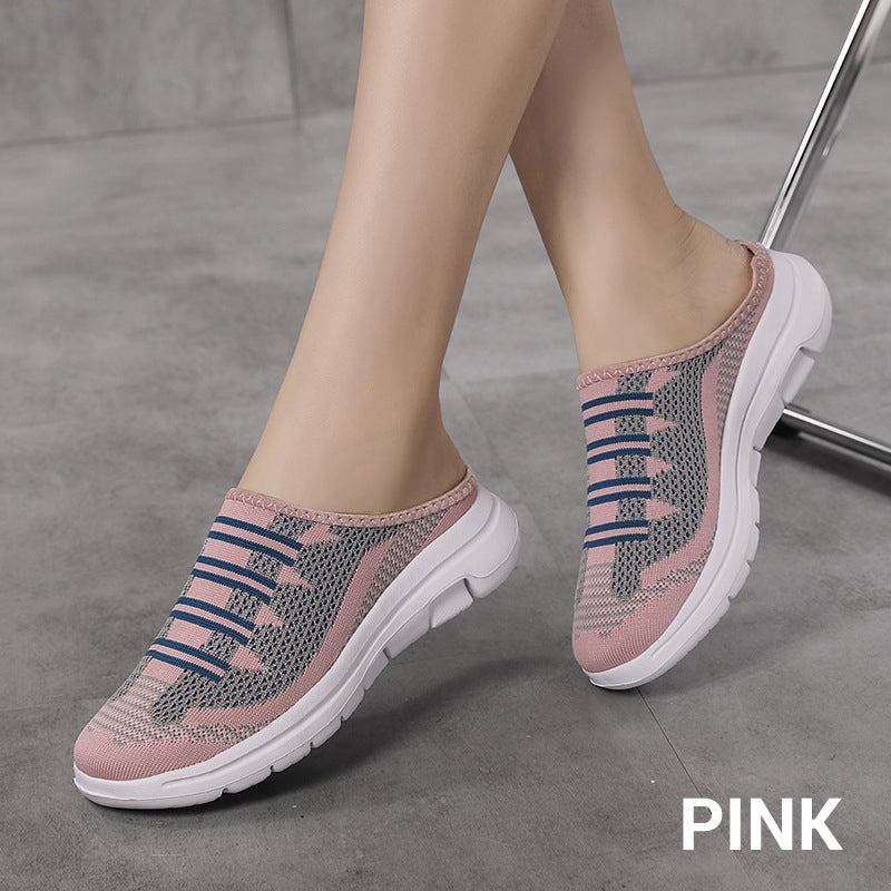 A pair of Arenzza comfortable closed-toe slide slippers featuring breathable fabric and a casual, cozy design for indoor wear.