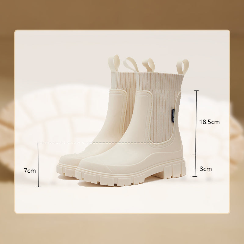 Arenzza waterproof non-slip mid-calf boots with thick soles, showcasing their sturdy design and practical style for outdoor wear.
