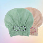 Aarenza coral fleece hair turban wrapped around a model's head, showcasing soft, plush fabric and snug fit for hair drying.