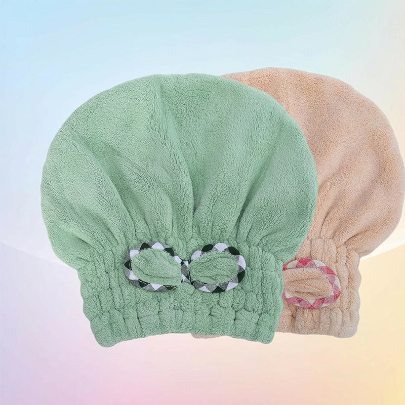 Aarenza coral fleece hair turban wrapped around a model's head, showcasing soft, plush fabric and snug fit for hair drying.