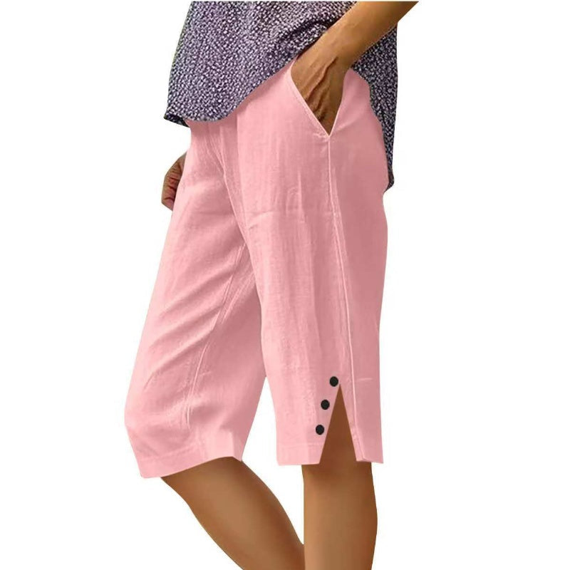 A woman wearing Arenzza women's casual solid color pocket Capri pants, showing the relaxed fit and side pockets.