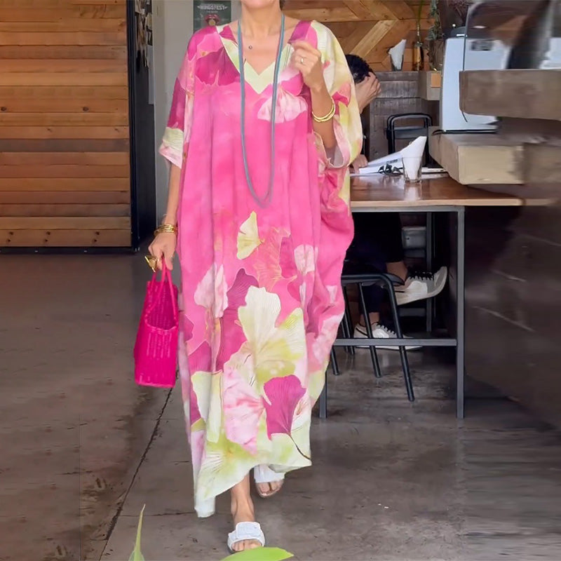 Aarenza floral print loose long dress with half sleeves, lightweight fabric, and relaxed fit, perfect for casual or summer wear.