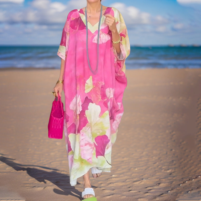 Arenzza floral print loose long dress with half sleeves, lightweight fabric, and a flowing silhouette perfect for casual or semi-formal wear.