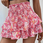 Aarenza lightweight floral ruffle tiered skirt in soft pastel colors, featuring a slim, flowy design for casual or dressy wear.