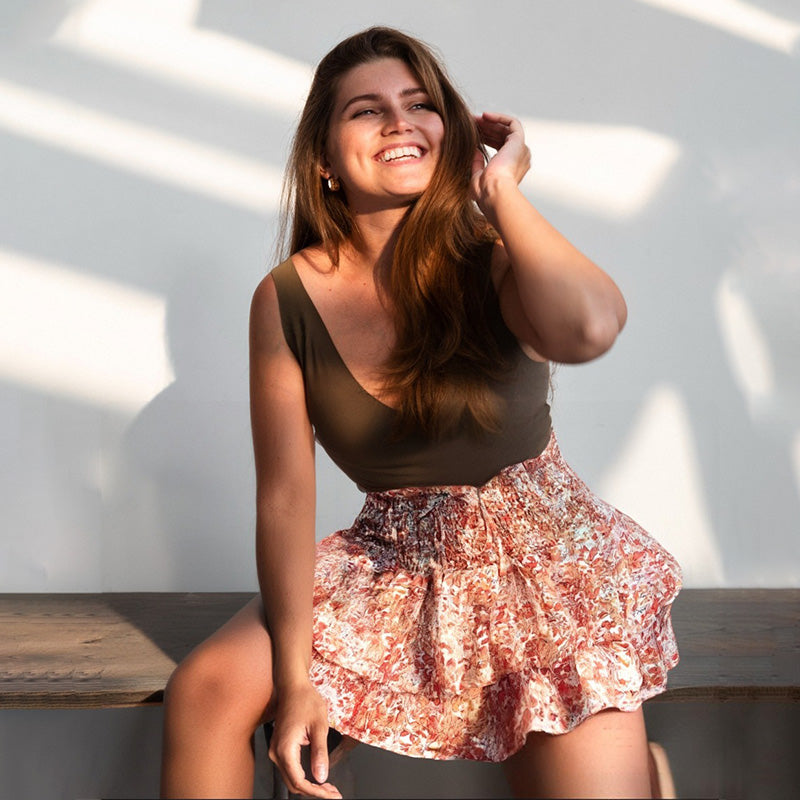 Aarenza floral ruffle tiered slimming skirt in lightweight fabric, featuring a feminine floral pattern and tiered design.