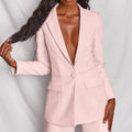 Women's elegant blazer and wide-leg pants set by Arenzza, featuring a stylish tailored jacket and flowing trousers.