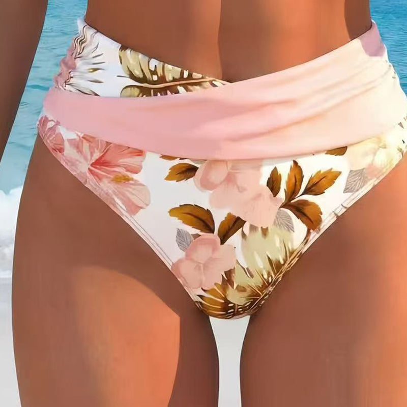 Women's floral print high waist bikini set by Arenzza, featuring a colorful, stylish two-piece swimsuit on a model.