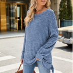 Women’s soft knit oversized tunic sweater by Arenzza, featuring a cozy, relaxed fit in a neutral color, suitable for casual wear.
