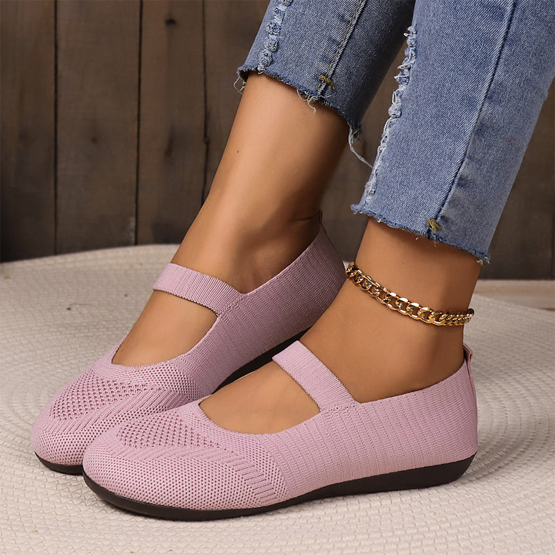 A pair of beige breathable knit flats from Arenzza with anti-slip soles, designed for comfortable, cool, and stylish everyday wear.