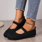 A pair of breathable knit flats from Arenzza with anti-slip soles, designed for comfortable, cool, and fresh feet.