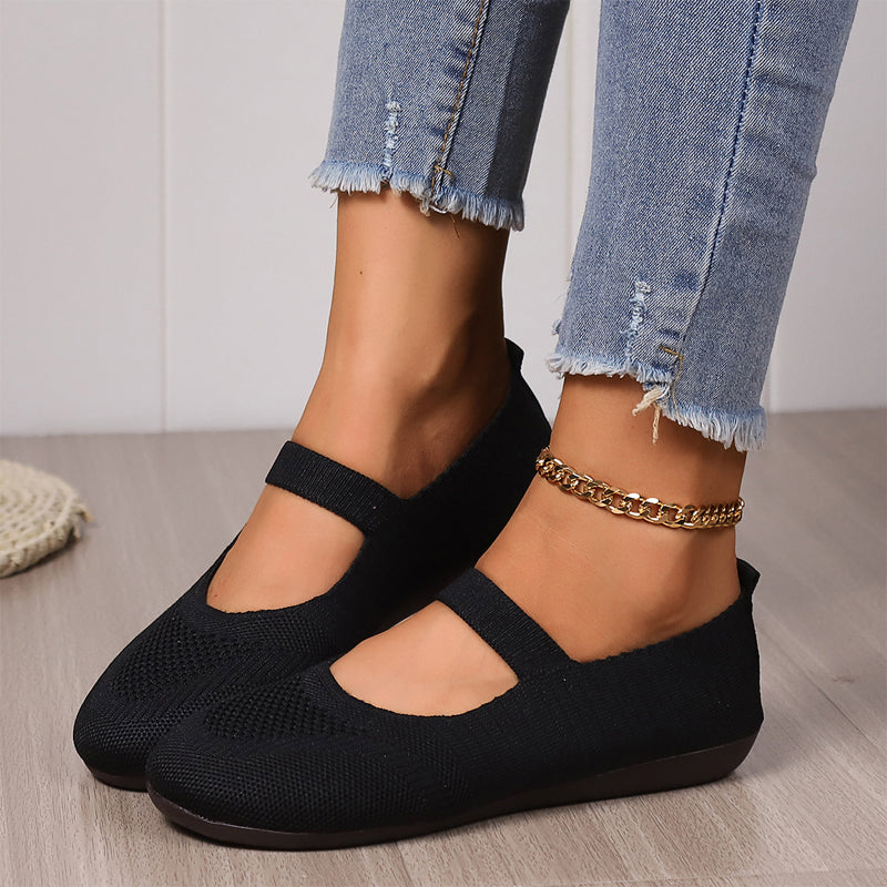 A pair of breathable knit flats from Arenzza with anti-slip soles, designed for comfortable, cool, and fresh feet.