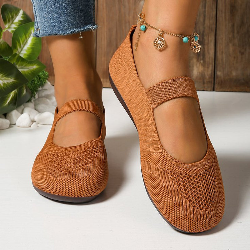 A pair of Arenzza breathable knit flats with anti-slip soles, designed for comfort and cool, fresh feet during extended wear.