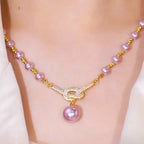 Aarenza women's pearl necklace with lustrous white pearls and a silver clasp, styled as elegant jewelry accessory.