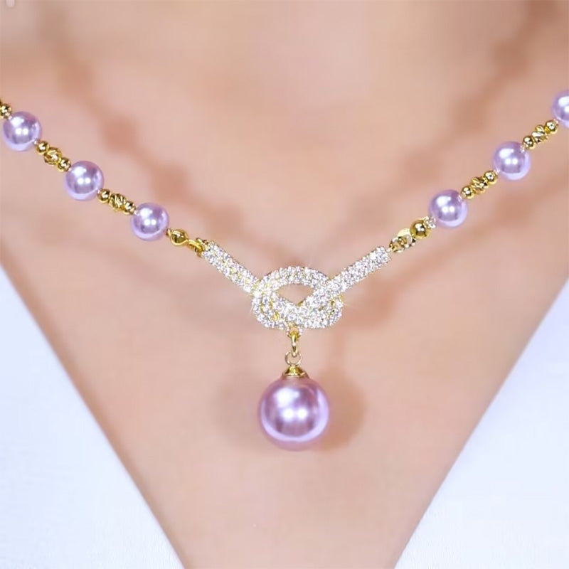 Arenzza women's pearl necklace featuring elegant white pearls on a delicate chain, perfect for stylish accessories.