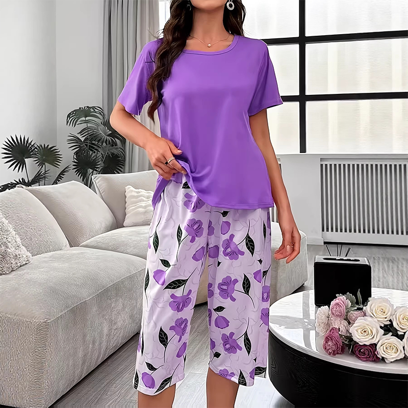 Aarenza women's comfortable pajama set with soft, airy fabric, perfect for warm nights, displayed on a hanger or laid flat.