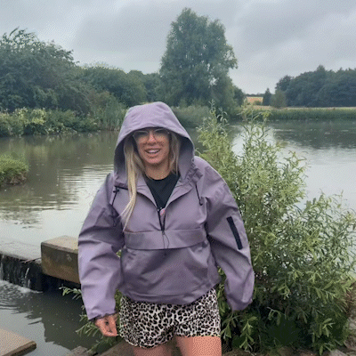 Aarenza 3-in-1 waterproof women's jacket with rain, wind, and cold protection, featuring a hood and adjustable features.