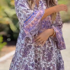 Women’s floral V-neck dress by Arenzza featuring a colorful, flowy fabric and a stylish V-neck design perfect for casual wear.