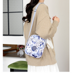 Aarenza lightweight fashion bag with multi-pocket design, featuring sleek style and practical compartments for accessories.