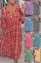 Arenzza bohemian casual print V-neck waist wrap long dress displayed on a hanger, featuring a colorful pattern and flowing fabric.