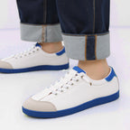 A pair of women's wide toe casual sneakers by Arenzza in neutral color, featuring comfortable design and wide toe box.