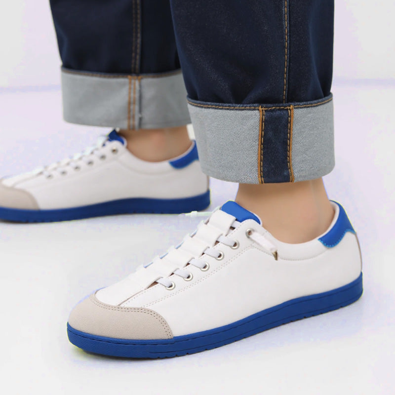 A pair of women's wide toe casual sneakers by Arenzza in neutral color, featuring comfortable design and wide toe box.