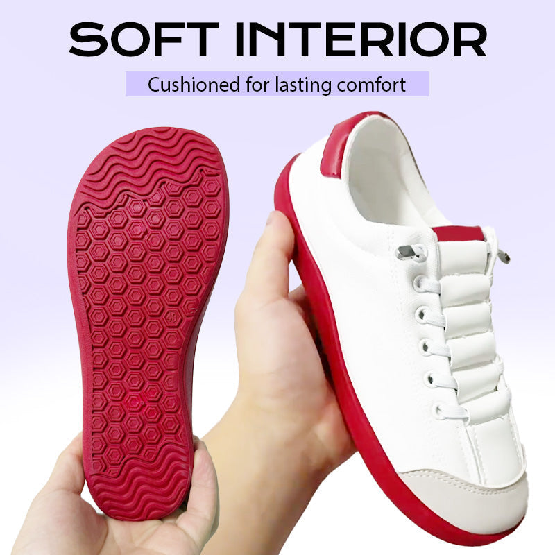 A pair of women's wide toe casual sneakers by Arenzza with white and gray design, featuring comfortable slip-on style.