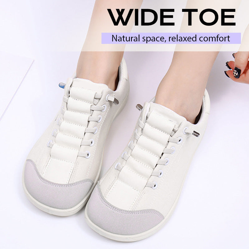 A pair of women’s wide toe casual sneakers by Arenzza featuring comfortable design and neutral color for everyday wear.