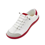 A pair of women's wide toe casual sneakers by Arenzza featuring a comfortable, stylish design with neutral tones and lace-up closure.