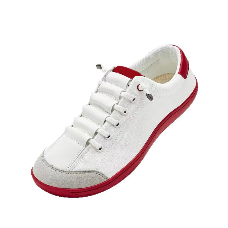 A pair of women's wide toe casual sneakers by Arenzza featuring a comfortable, stylish design with neutral tones and lace-up closure.