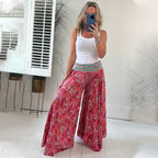 A pair of Arenzza ethnic paisley print lightweight pants with elastic patchwork waist and colorful design.