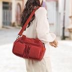 Aarenza stylish water-resistant crossbody bag in black with adjustable strap and minimalist design, suitable for everyday use.