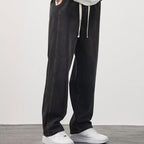 Men's loose straight jeans by Arenzza, casual denim pants with a relaxed fit, shown in a neutral color on a plain background.