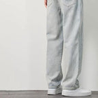 A pair of men's loose straight jeans by Arenzza, showing the fit and denim fabric detail in a casual clothing image.