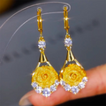 Elegant mesh rose earrings by Arenzza featuring delicate floral design and silver hooks for stylish accessories.