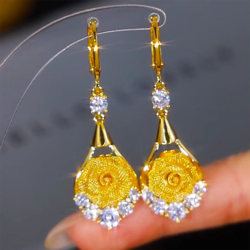 Elegant mesh rose earrings by Arenzza featuring delicate floral design and silver hooks for stylish accessories.