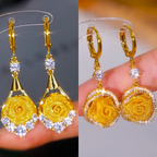 Elegant mesh rose earrings by Arenzza featuring delicate floral design and lightweight metal construction.
