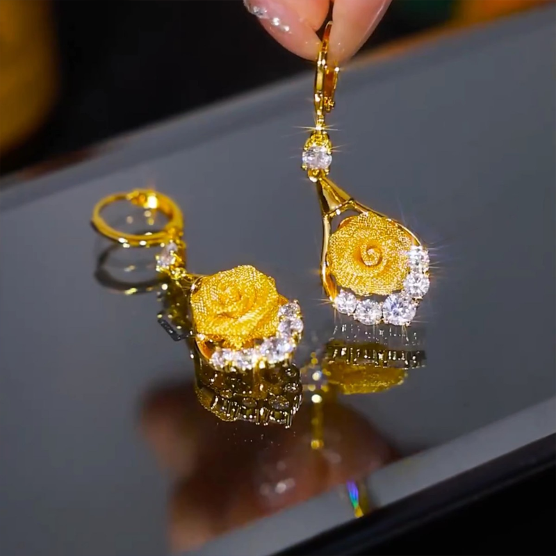 Elegant mesh rose earrings by Arenzza featuring delicate floral design and silver-tone hooks for stylish accessories.