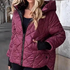 A tan quilted cotton jacket with hood by Arenzza, designed for winter warmth and casual outdoor wear.