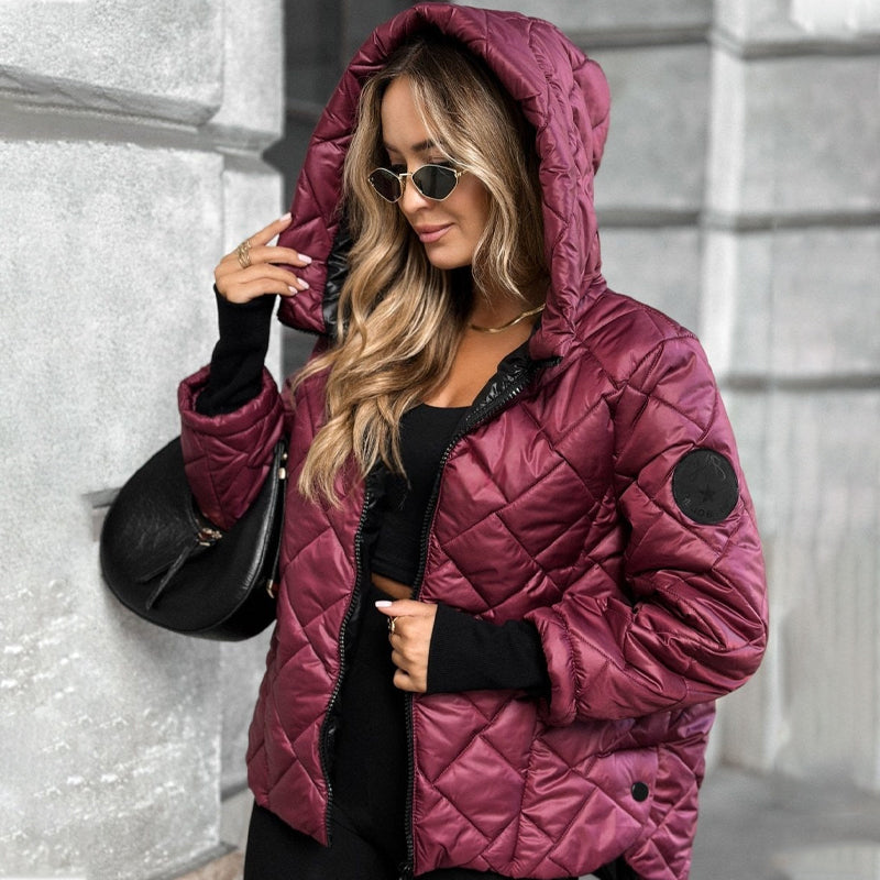 Aarenza quilted cotton winter jacket with hood, featuring a stylish design and insulated for warmth and comfort.