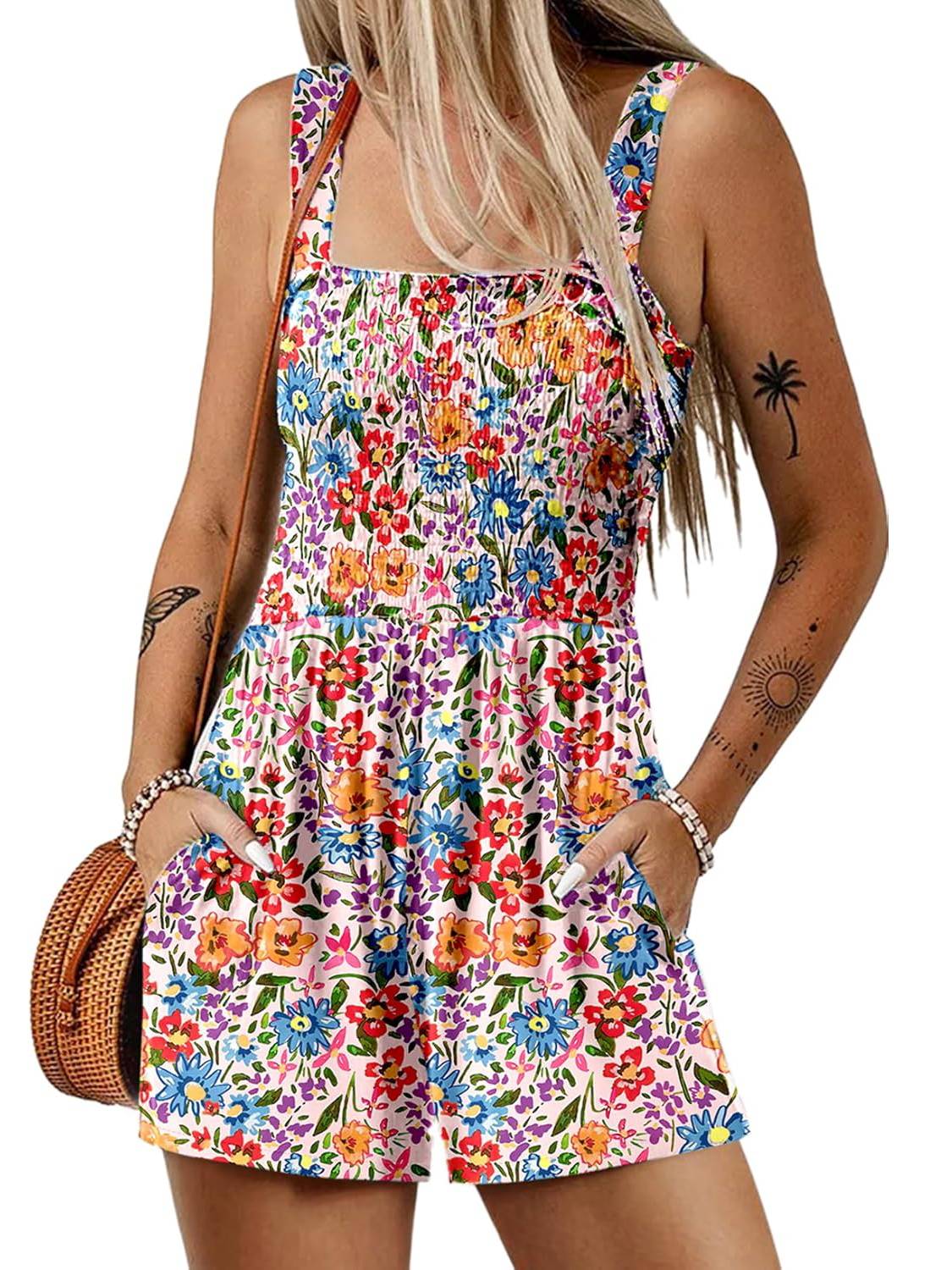 A women's sleeveless summer romper with a square neck, loose fit, smocked waist, in a casual style by Arenzza.