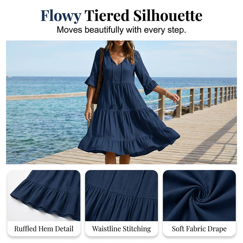 Aarenza women's V-neck tassel tie tiered midi dress in lightweight fabric with tassel details and a flowing silhouette.