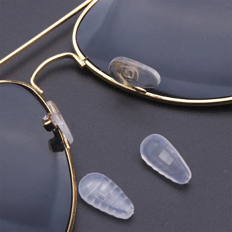 Arenzza eyeglass nose pad repair kit with replacement nose pads and tools for repairing and replacing eyewear nose pads.