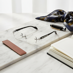 A pair of blue light reading glasses from Arenzza with clear lenses and stylish frame, suitable for computer use and reading.